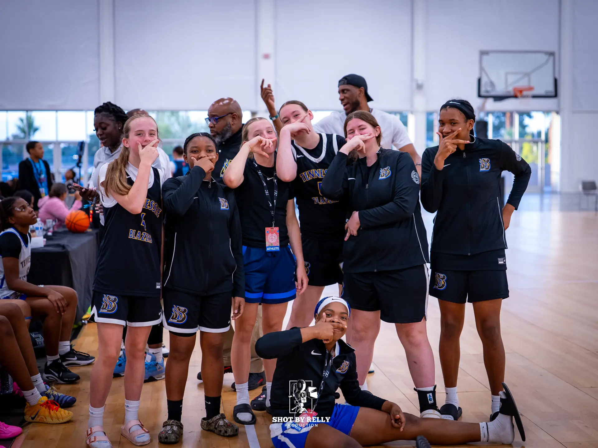 Tennessee Blazers girls team celebrating together on the court
